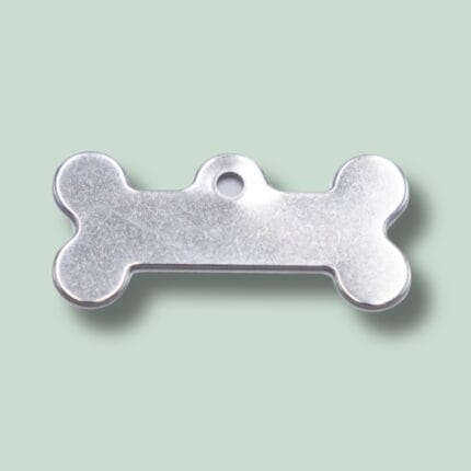Metalskilt formet som et hundeben