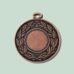 Bronzemedalje med laurbærkrans på grøn baggrund