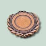 Vintage bronzemedalje på grøn baggrund