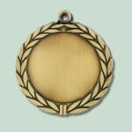 Guldmedalje med laurbærblad-design