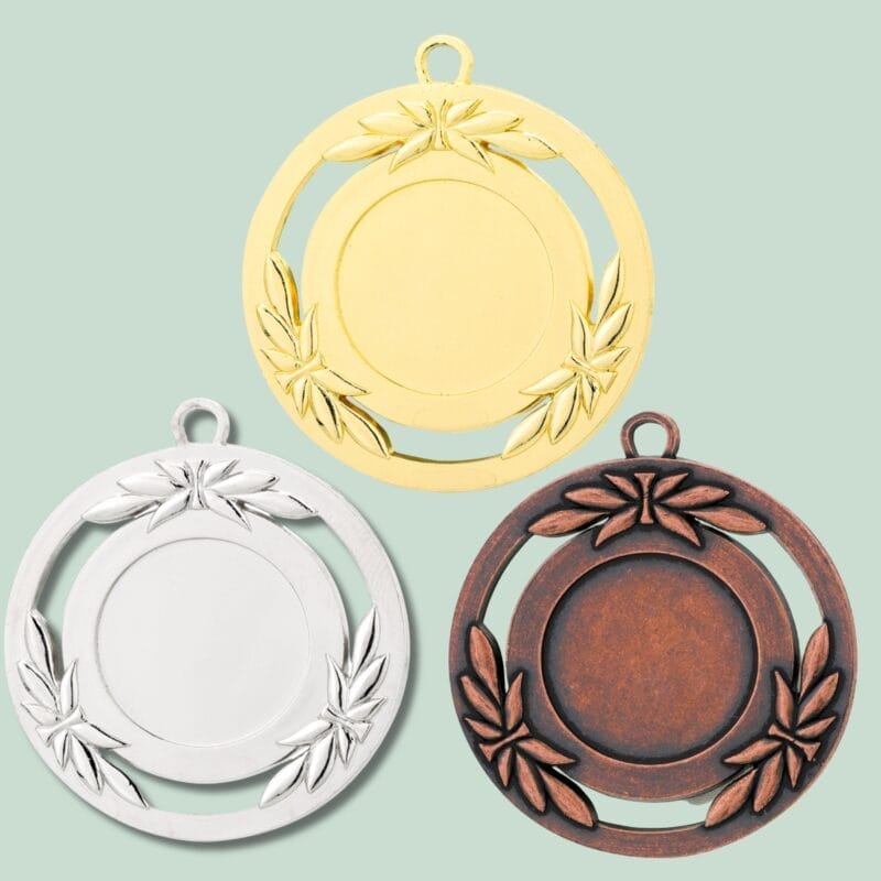 Tre medaljoner i guld, sølv og bronze