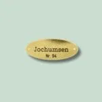 Messingskilt med navnet Jochumsen og nummer 94
