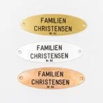 Dørskilte i forskellige metaller: familie Christensen Nr. 84