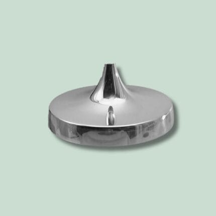 Sølvfarvet metal top mod lys baggrund