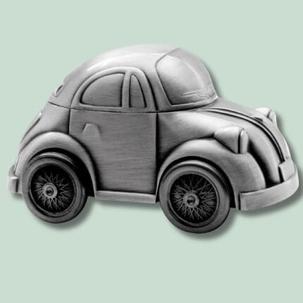 Metalbil i retro design på grå baggrund.