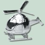 Sølv helikopter dekoration på grøn baggrund