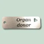 Metalplade med indgraveringen "Organ donor