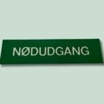 Skilt med teksten Nødudgang