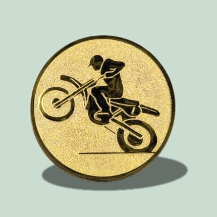Gul medalje med motorcykelmotiv på grøn baggrund.