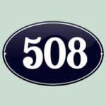 Sort ovalt skilt med tallet 508