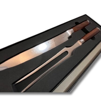 Professionelt sæt med kniv og stegegafler i boks.